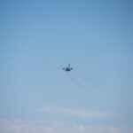 Illustrative stock photograph of a military transport aircraft in flight; not a Ukrainian interceptor drone or Russian attack UAV.