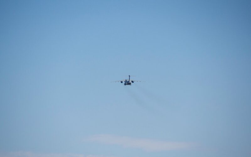 Ukraine Races to Develop Interceptor Drones Against Faster Jet-Powered Attack UAVs Illustrative stock photograph of a military transport aircraft in flight; not a Ukrainian interceptor drone or Russian attack UAV.