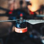 Representative black-and-red quadcopter UAV; illustrative image only, not a Gopalan Aerospace product or its Hoskote production line.